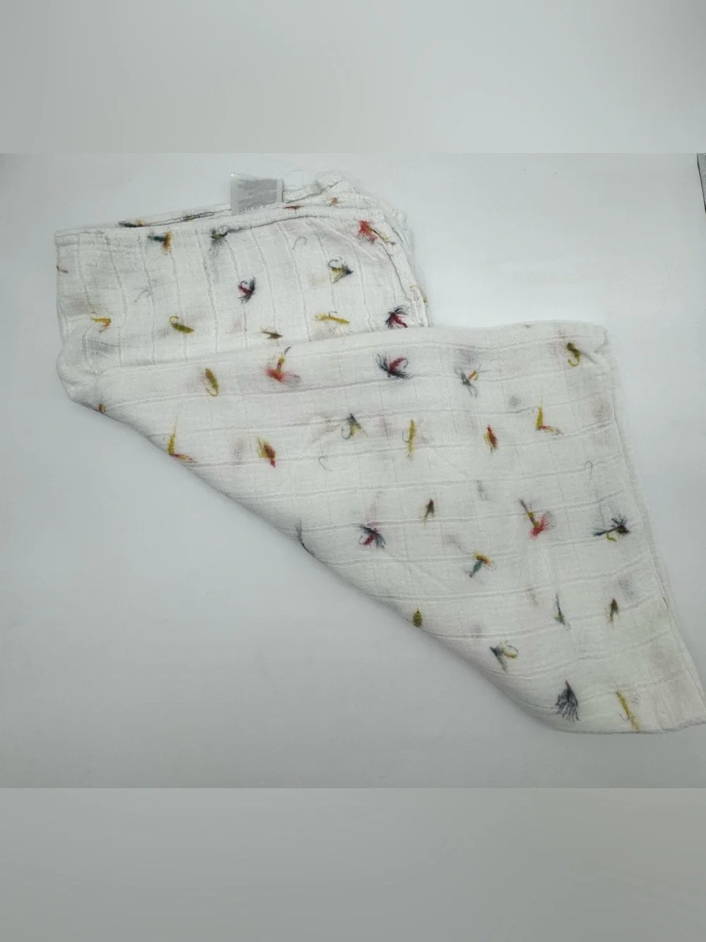 Little Unicorn Muslin Swaddle Blanket in Fishing Lures Print
